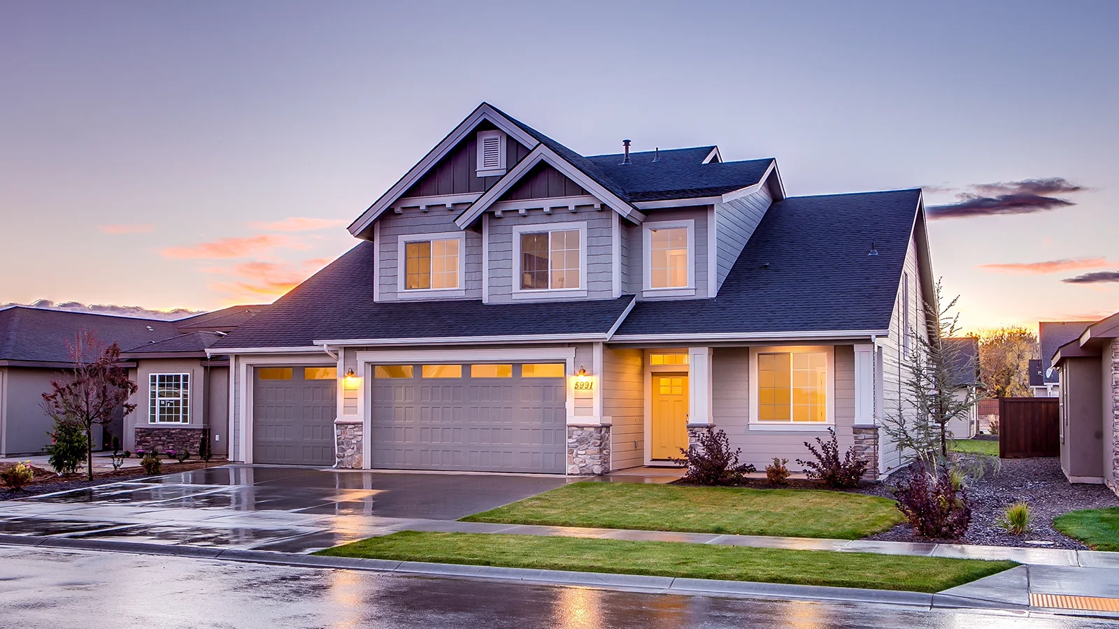 Front exterior of new house and its beautiful garage